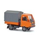 Busch 42253 Multicar M26 mit Pritsche / Plane, orange...